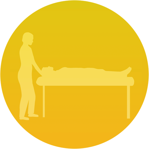 Person giving a treatment to someone lying on a massage table, yellow background.